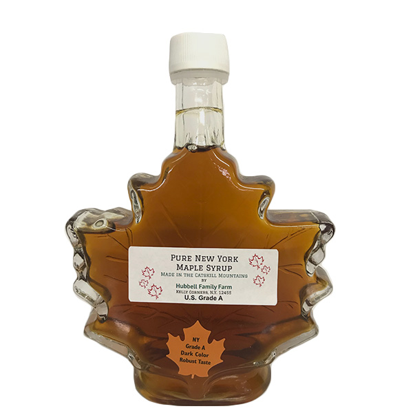glass maple leaf of maple syrup
